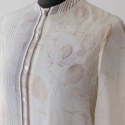 Cream silk shirt with mandarin collar and black stripe detail on half of right front and on collar eco printed with pale grey, lilac and brown cotinus leaf prints