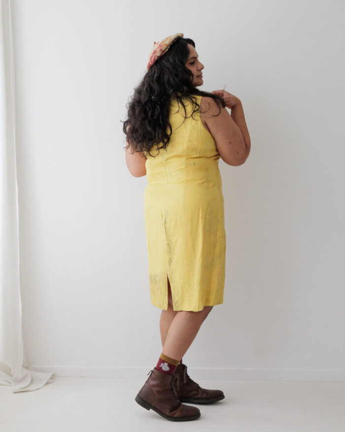 Yellow silk sleeveless dress eco printed with orange eucalyptus leaves