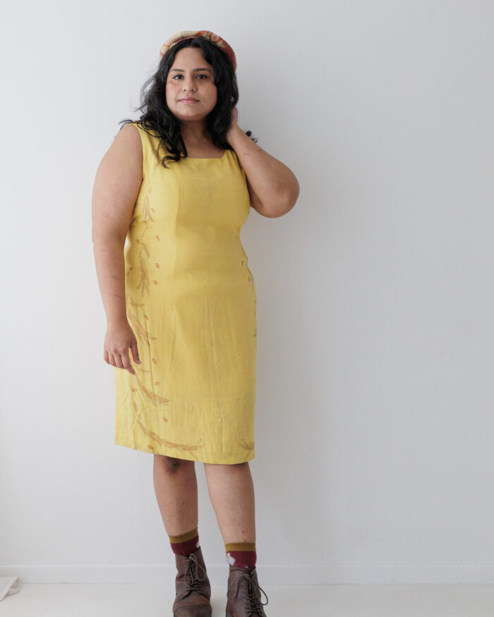 Yellow silk sleeveless dress eco printed with orange eucalyptus leaves