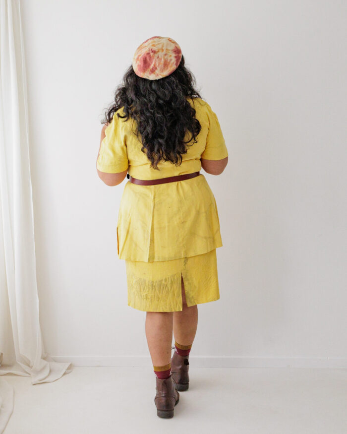 Yellow silk sleeveless dress and matching short sleeved coat eco printed with orange eucalyptus leaves