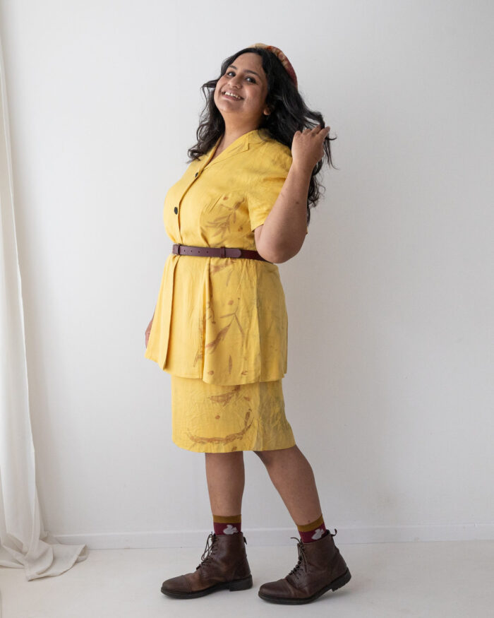 Yellow silk sleeveless dress and matching short sleeved coat eco printed with orange eucalyptus leaves
