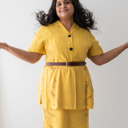 Yellow silk sleeveless dress and matching short sleeved coat eco printed with orange eucalyptus leaves